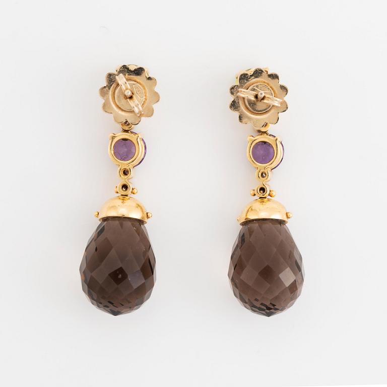 A pair of 18K gold earrings with briolette-cut smoky quartz, peridot, amethyst.