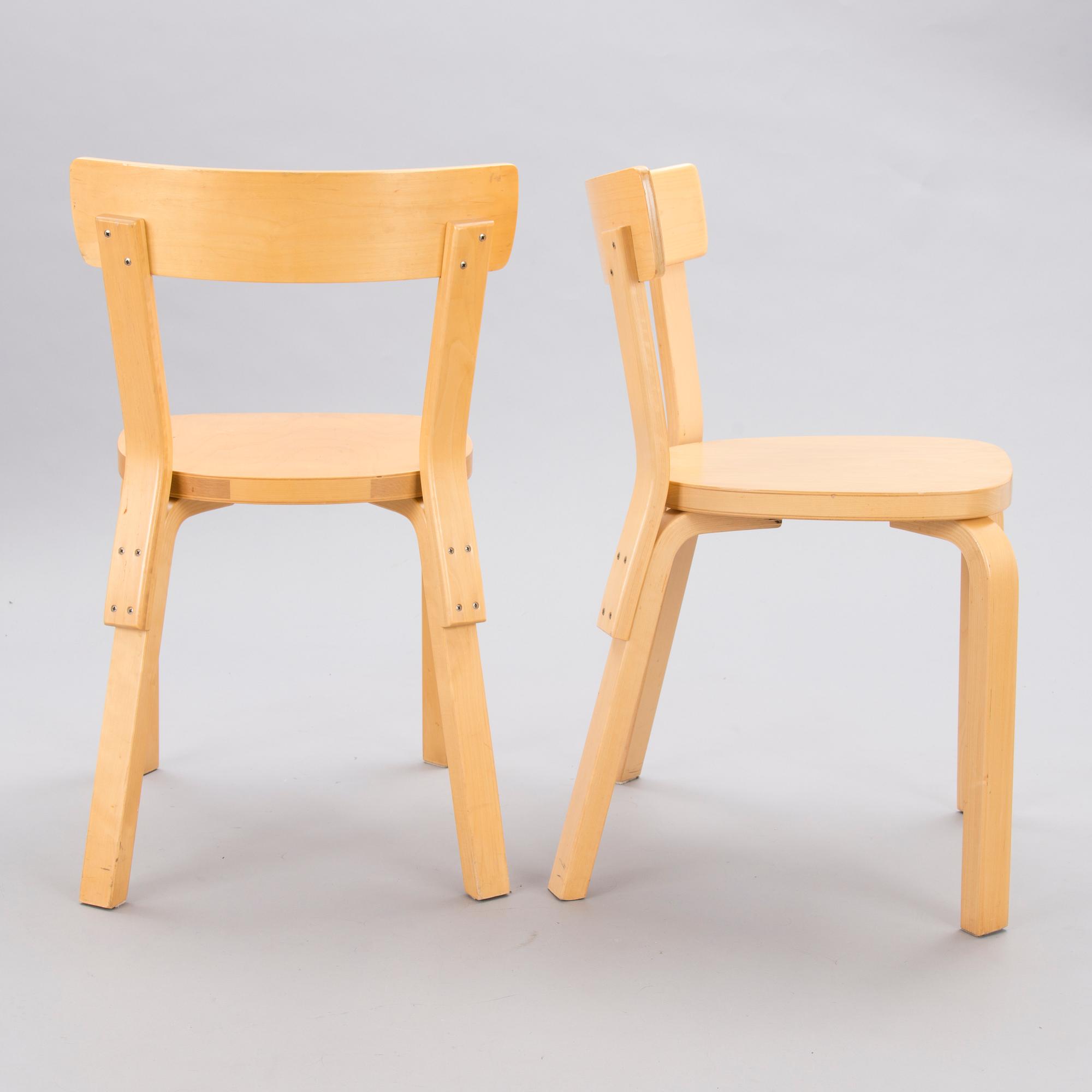 A Set of Three model 69 Chairs by Artek, late 20th Century.