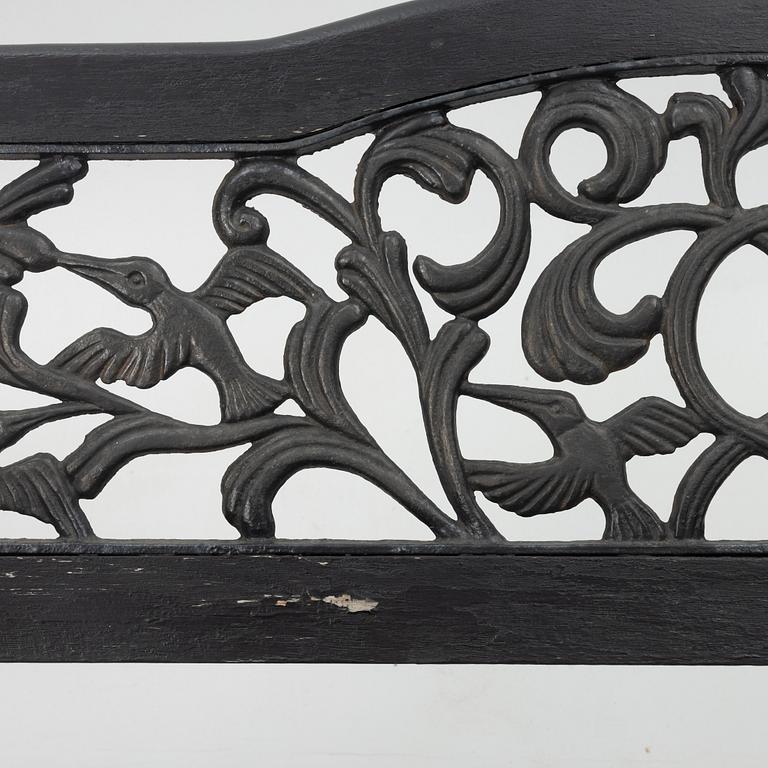 A garden bench, late 20th century.