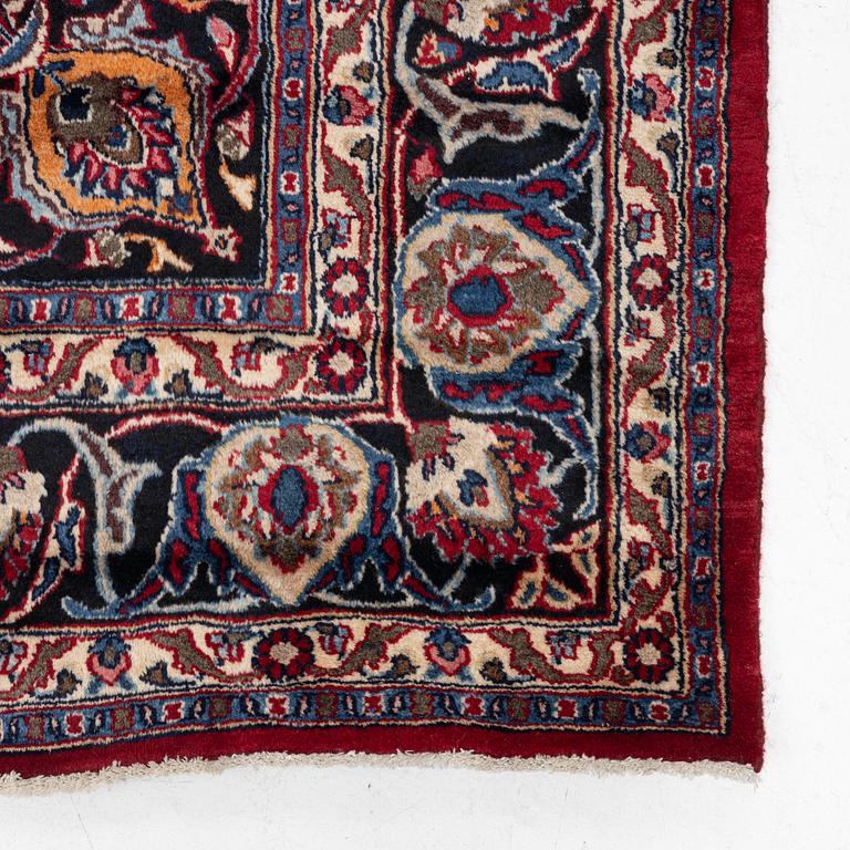 A carpet, Oriental, c. 335 x 257 cm.