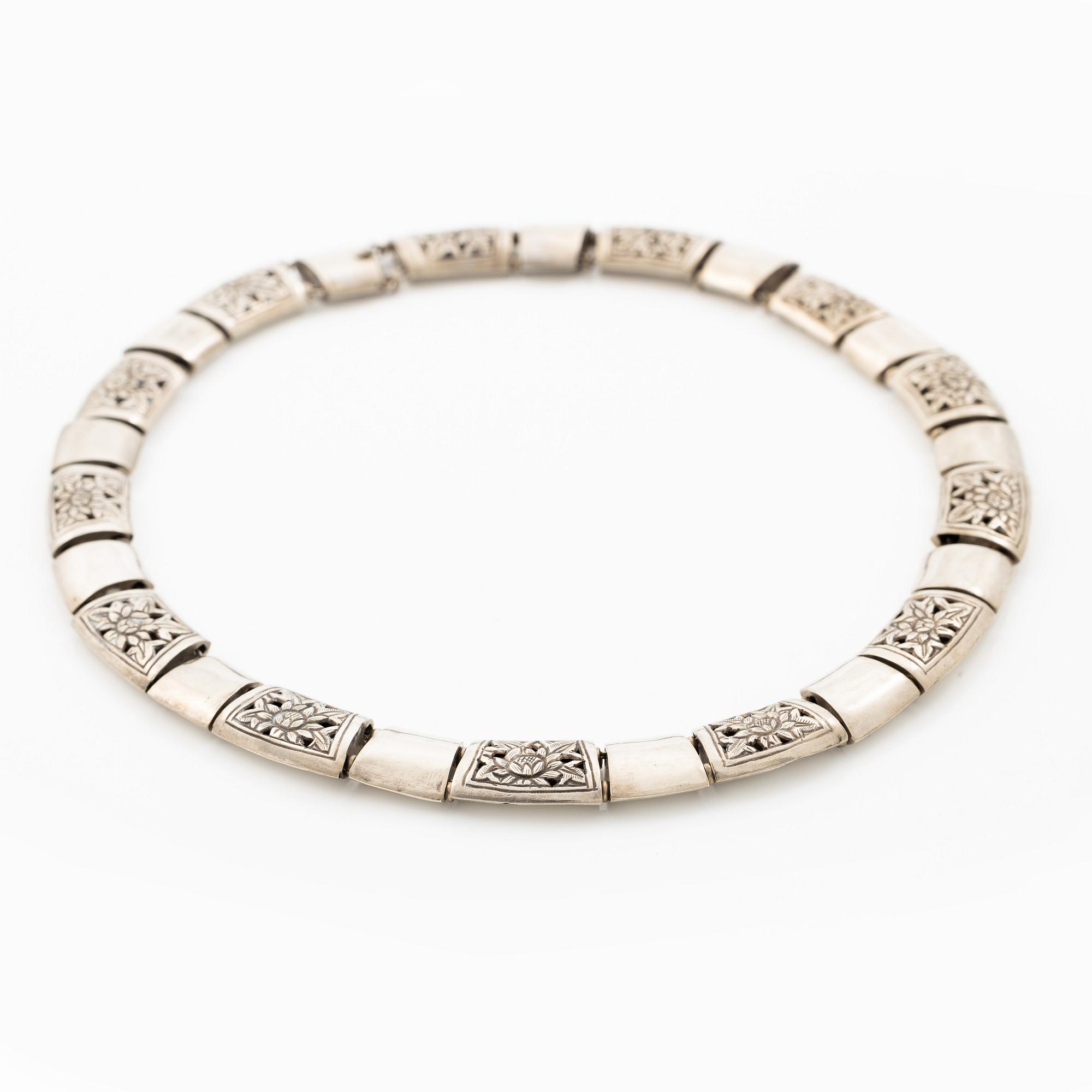 Silver necklace.