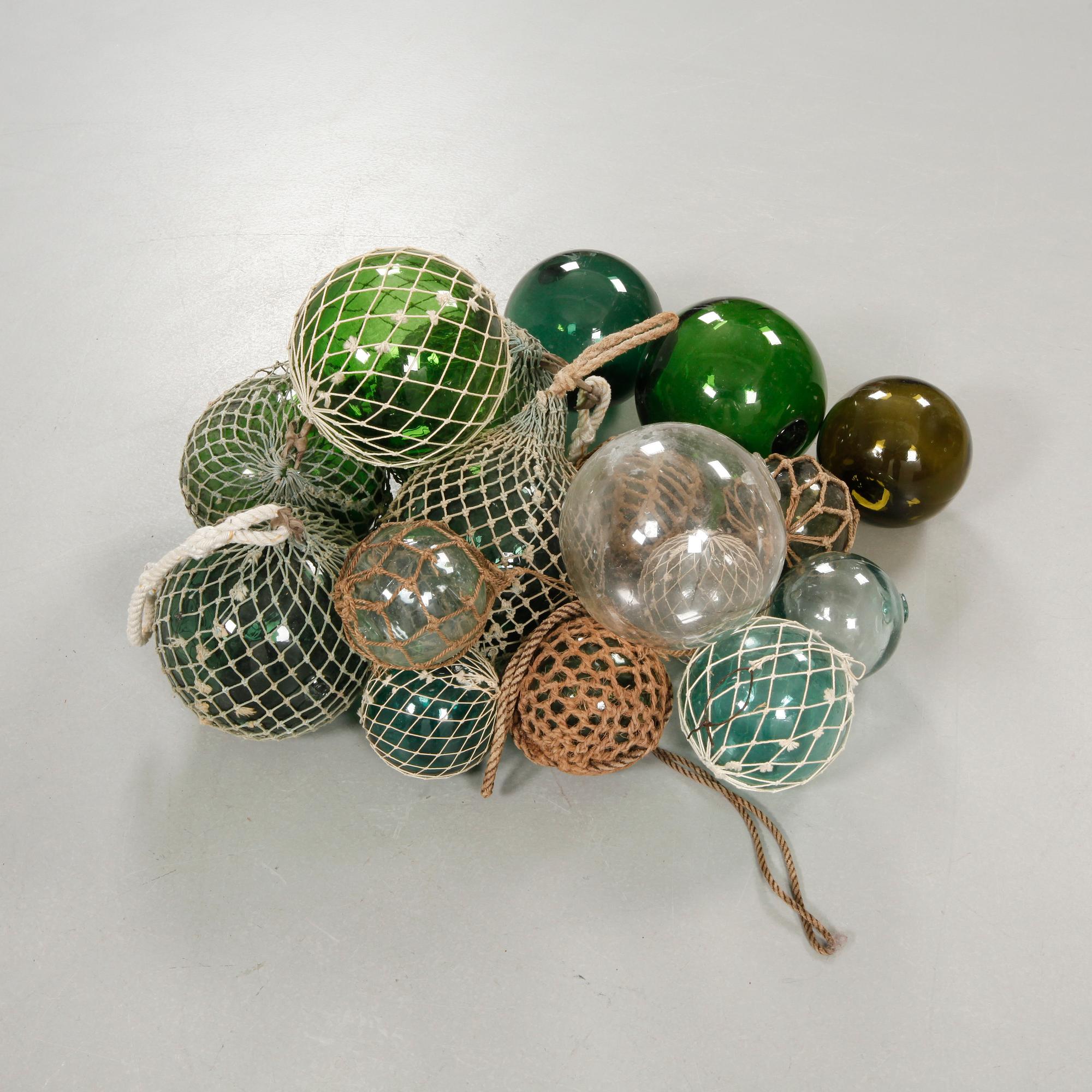 Seventeen glass fishing floats, 20th century.