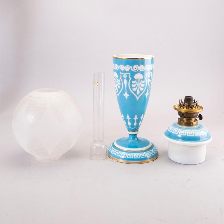 A glass paraffin lamp around 1900.