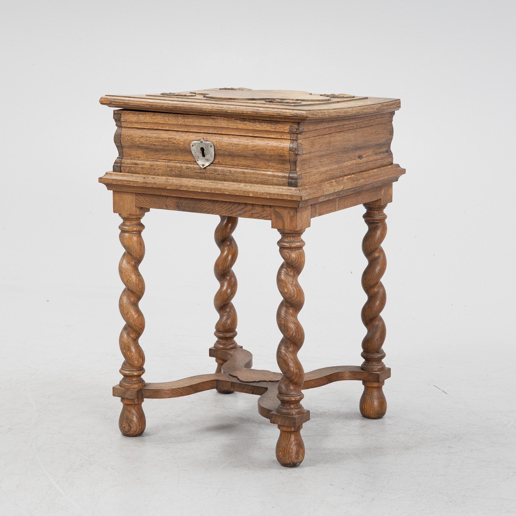 A baroque style oak chest, around 1900.