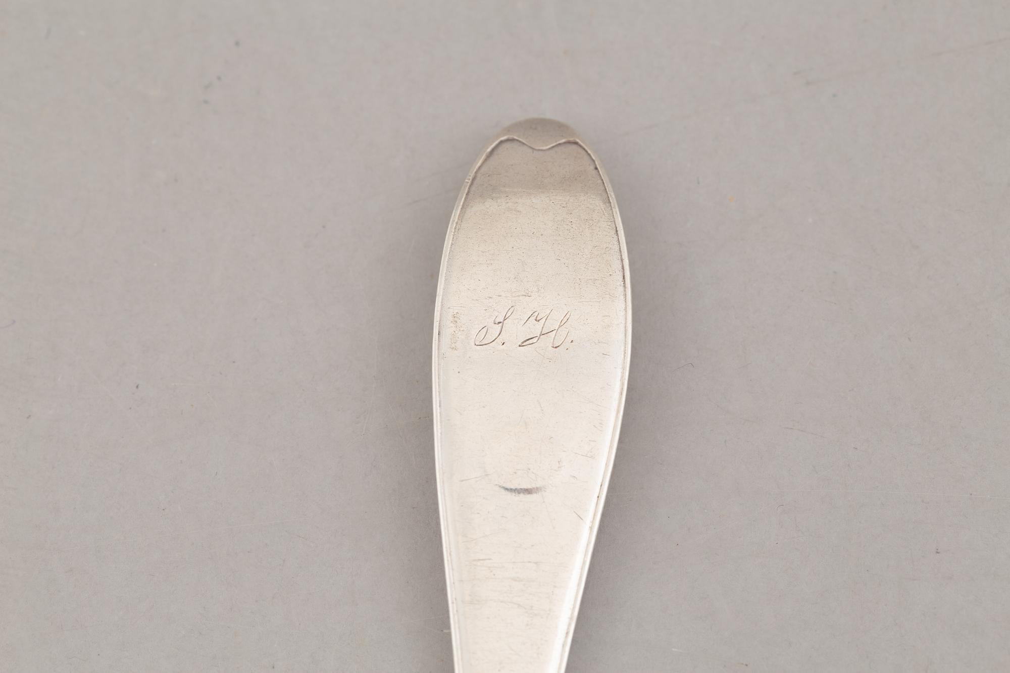 Nine Swedish Silver Table Spoons and a Sauce Ladle, 19th Century.