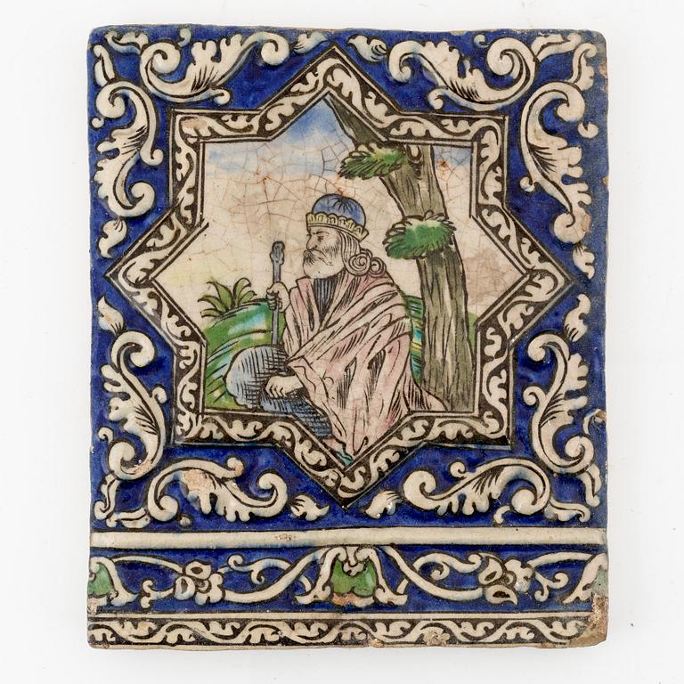 A Persian (Iranian) tile, glazed pottery, Qajar dynasty, 19th century.