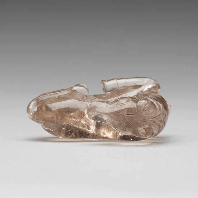 A quartz carving of a reclining horse, China.