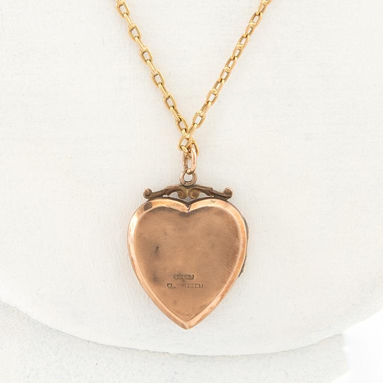 Halsband 18K guld med en berlock 9K guld i form av ett hjärta.