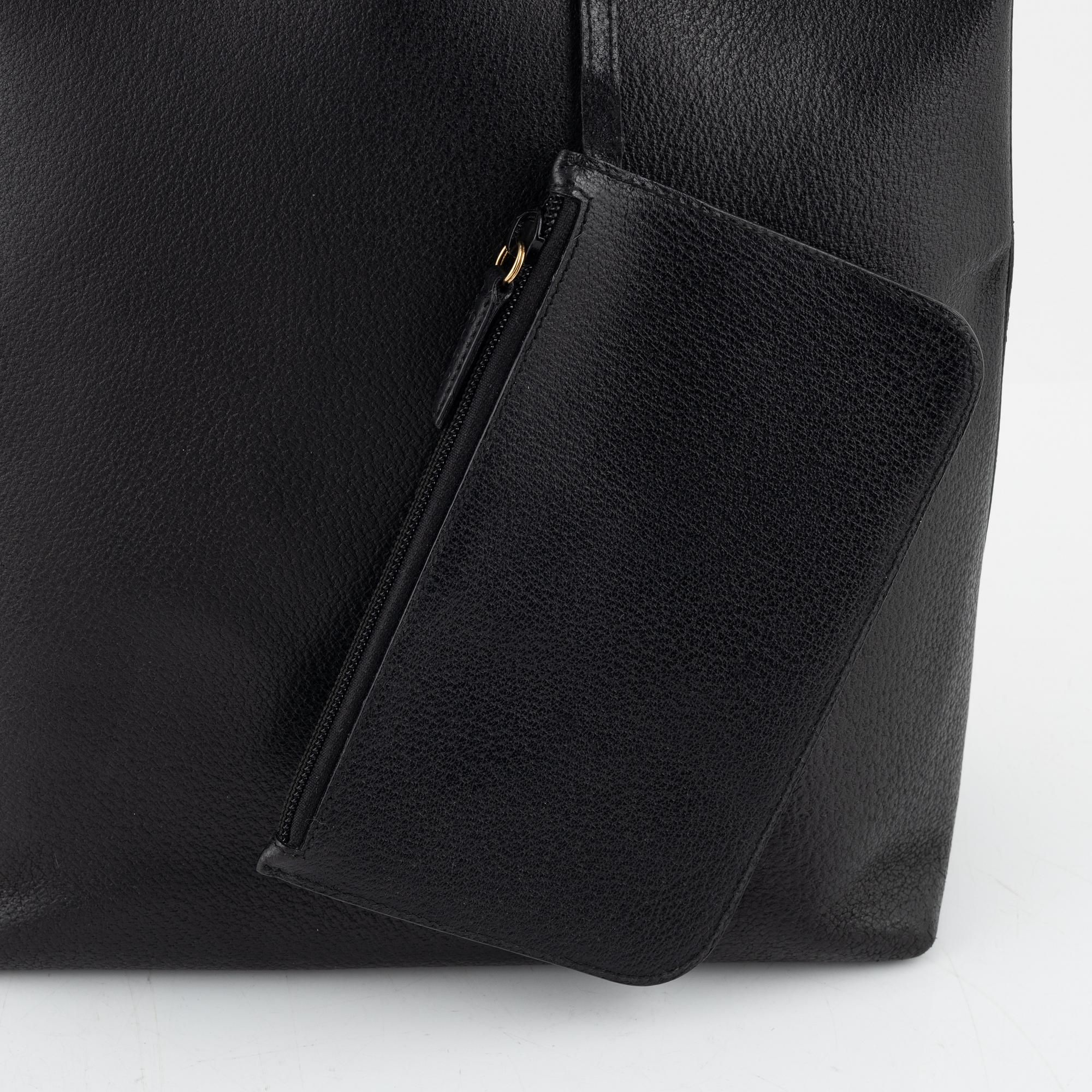 Gucci, a black leather 'Bamboo' bag.