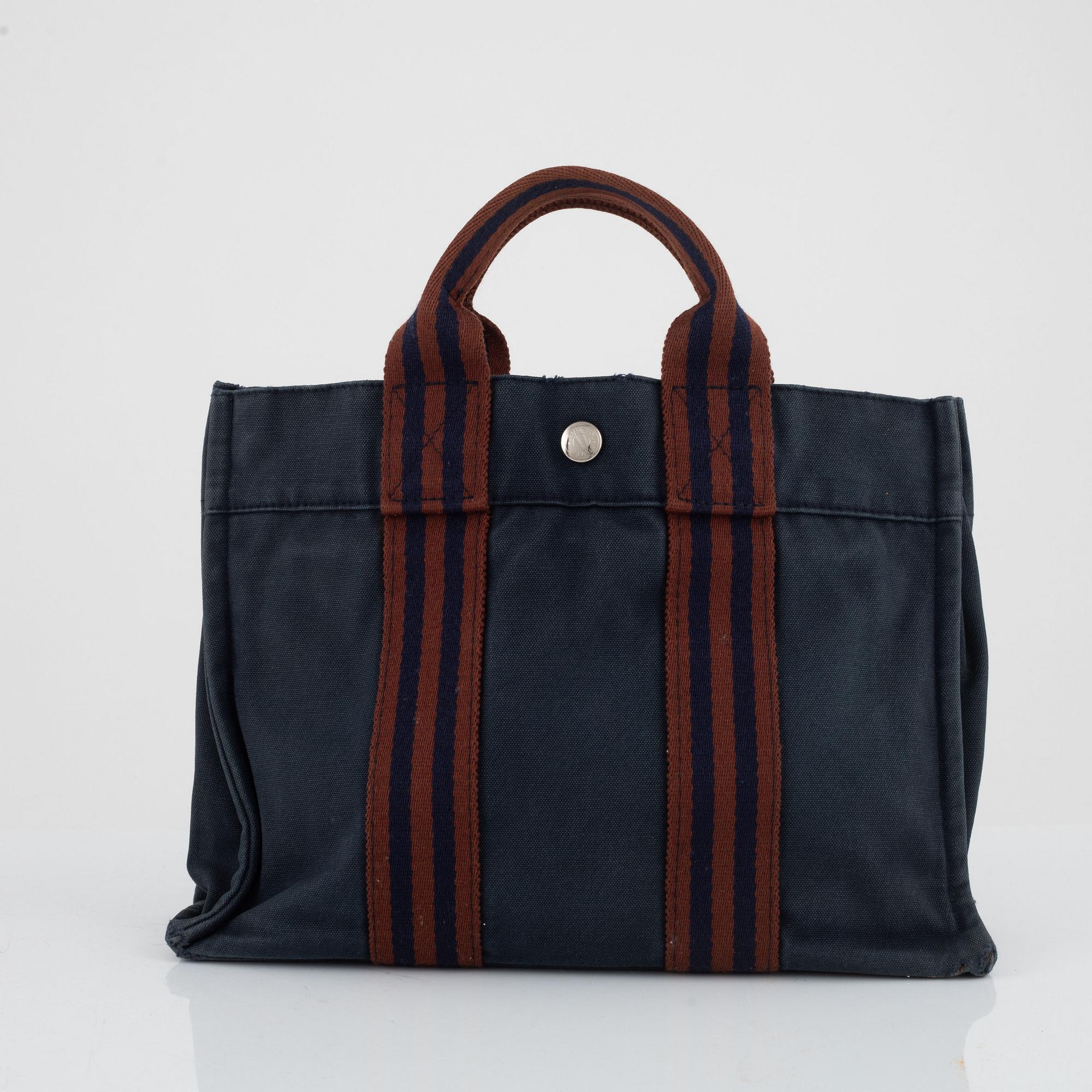 Hermès, "Fourre tout PM" bag and toiletry bag.