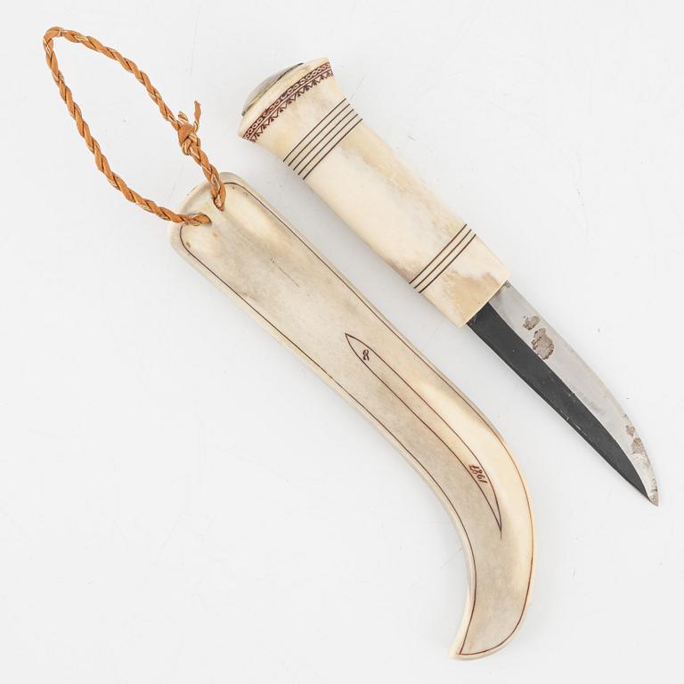 Esse Poggats, a reindeer horn knife, signed and dated 1987.