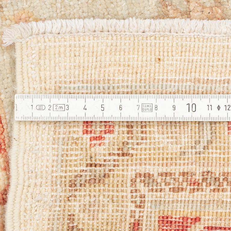 A carpet, Ziegler, ca 309 x 196 cm.