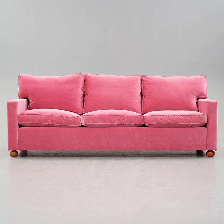 Josef Frank, a pink velvet upholstered three seated sofa, Svenskt Tenn, model 3031.