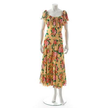 836. MOSCHINO COUTURE, a flower printed yellow silk dress.
