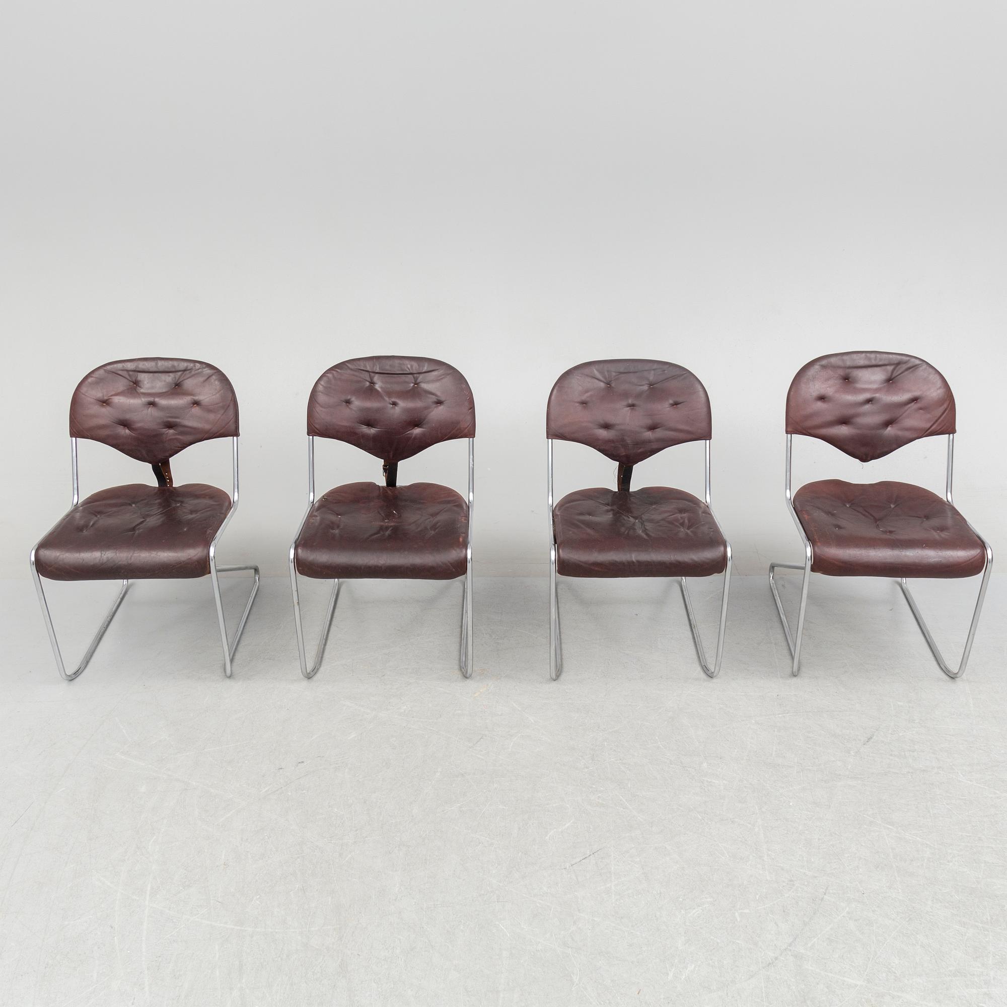 A set of four chairs by Sam Larsson, Dux, late 20th century.