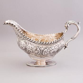 An English early 19th century silver cream-jug, mark of Abraham Peterson, London 1803.