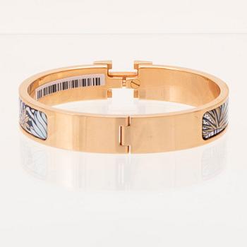 Hermès roséguldpläterat "Clic H" armband med "Animaux Camoufles" emaljering.