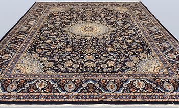 A Keshan carpet, approx. 400 x 295 cm.