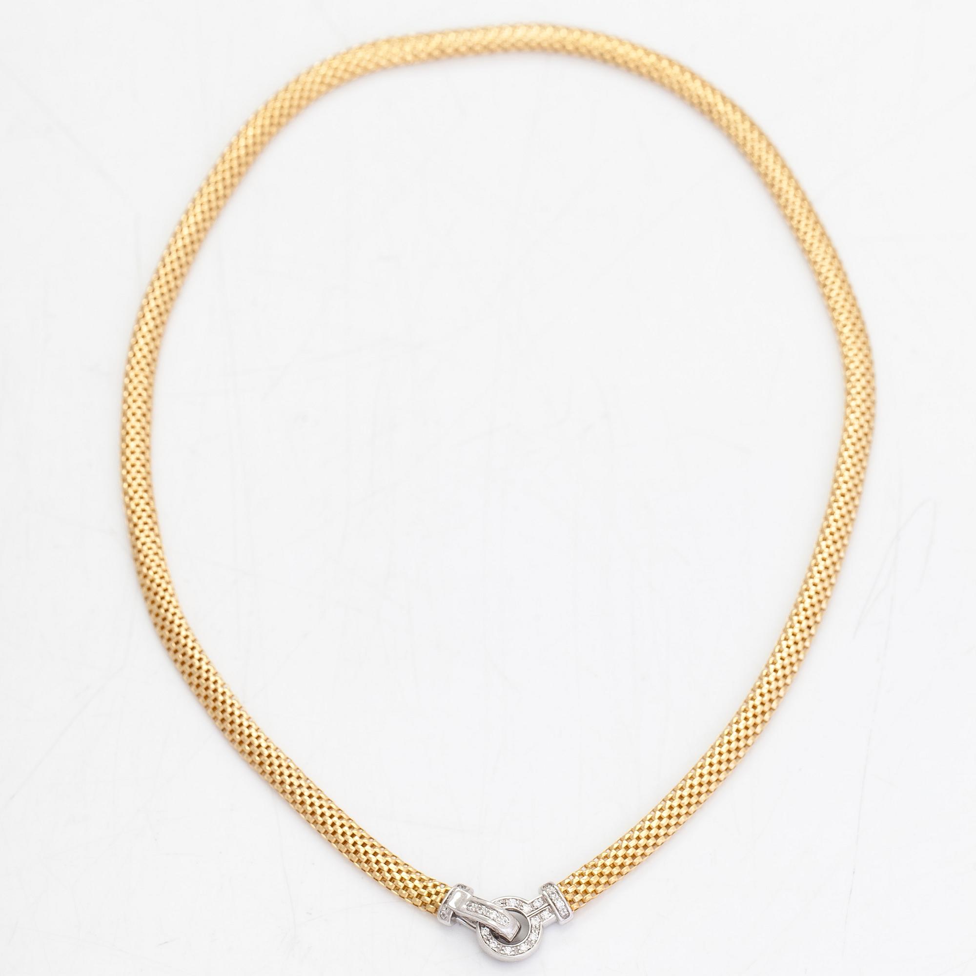 Halsband, 18K guld/vitguld, diamanter totalt ca 0.21 ct, Italien.