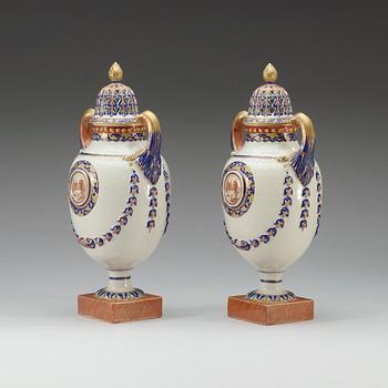 A pair of 'Marieberg shaped' jars with covers, Qing dynasty, Jiaqing (1796-1820).