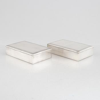 Two silver 830 cigarette cases, Swedish import marks, MEMA, circa mid-20th century.