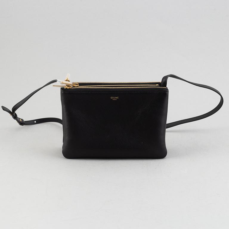 Céline, a black leather 'Trio Bag'.