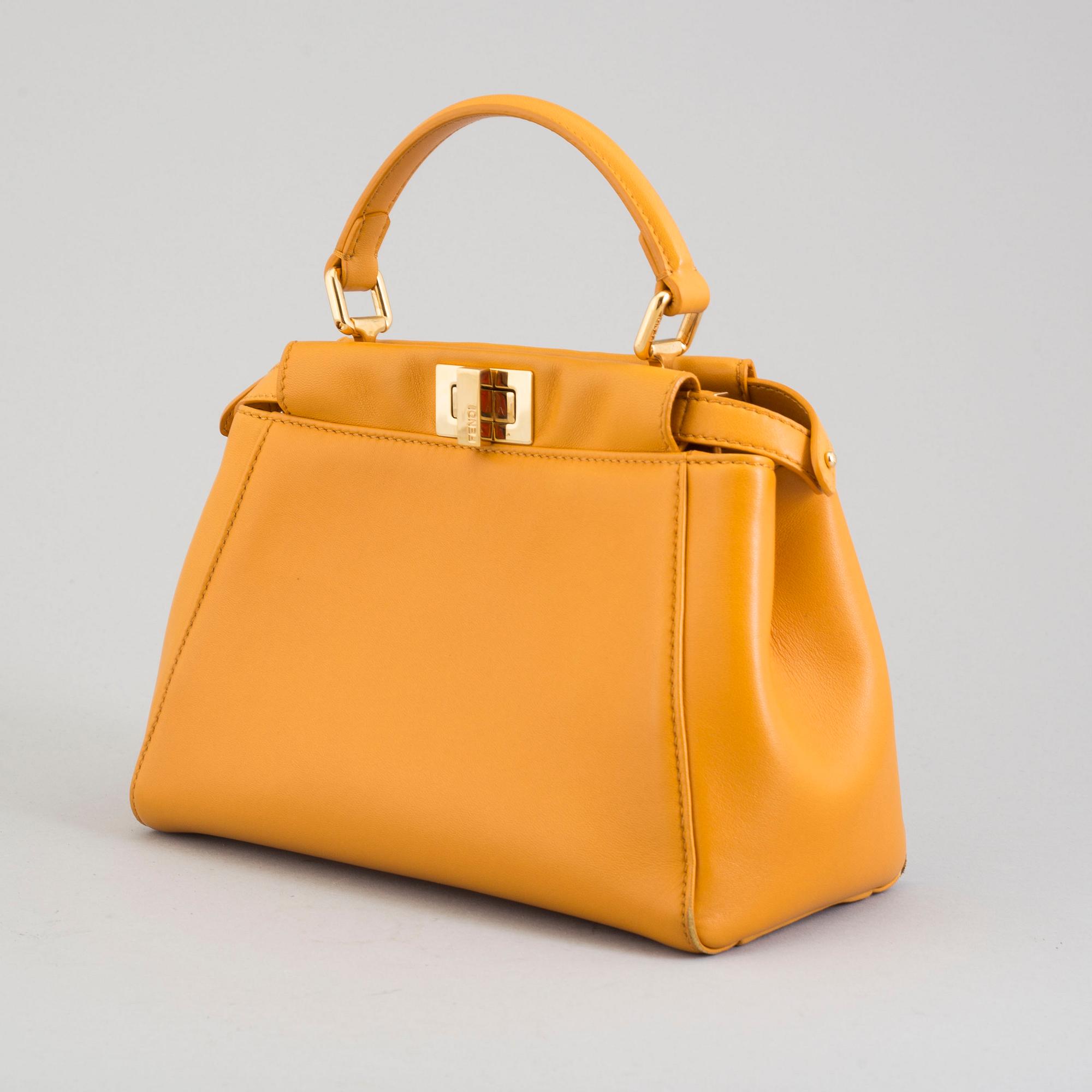 a Fendi 'Peekaboo' bag.