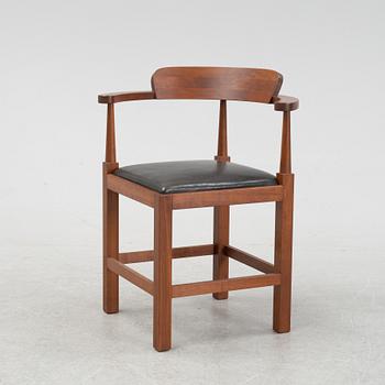 Torbjörn Ahlström, a mahogany chair.