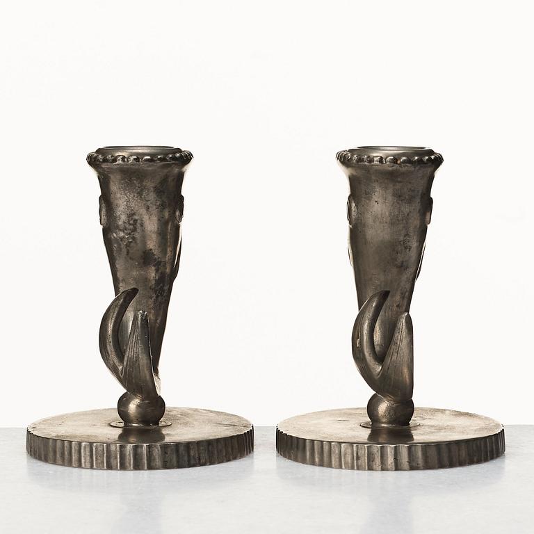 Carl Milles, a pair of pewter candlesticks and inkwell, Herman Bergman, 1930, the model exhibited at the Stockholm Exhibition.