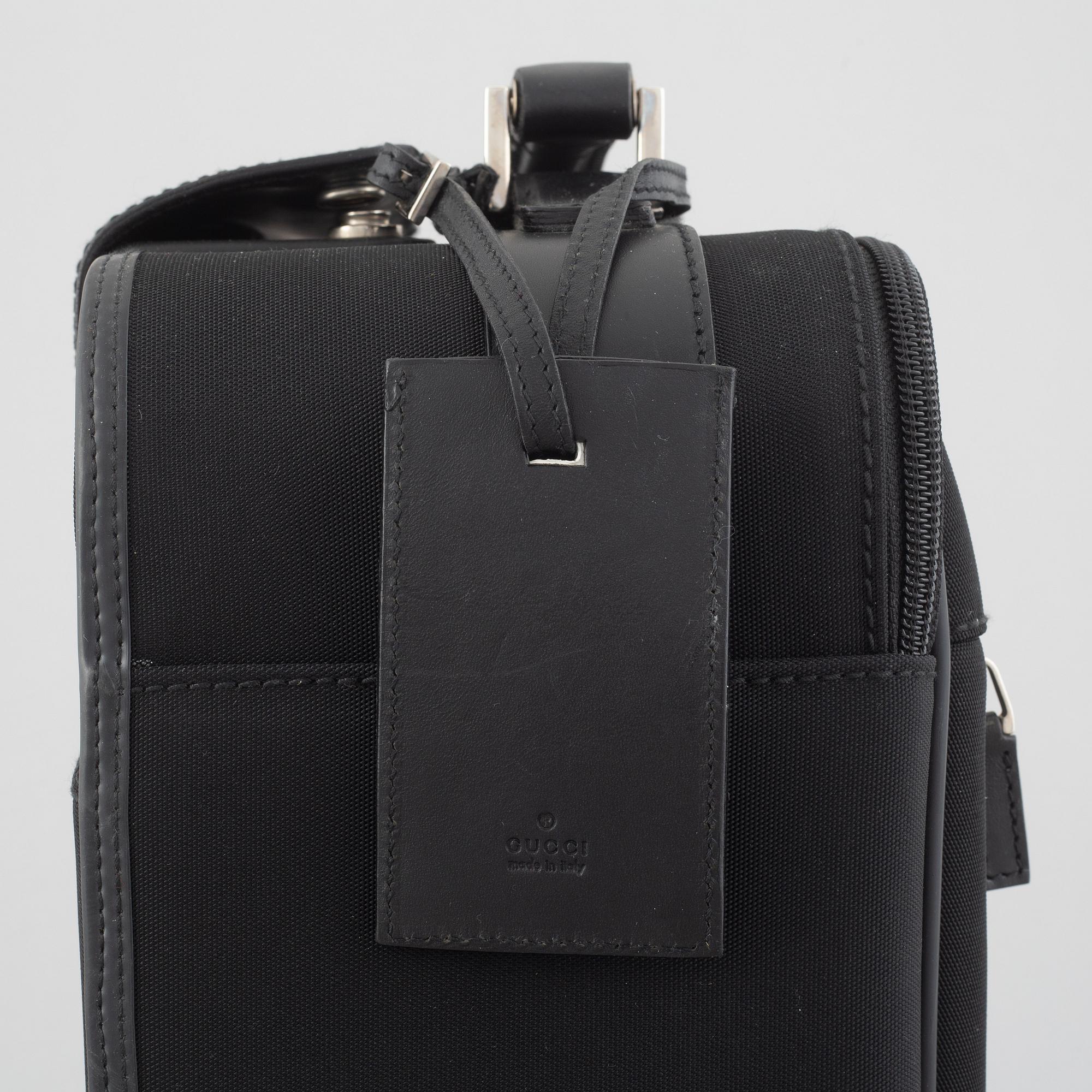 Gucci, suitcase/cabin bag.