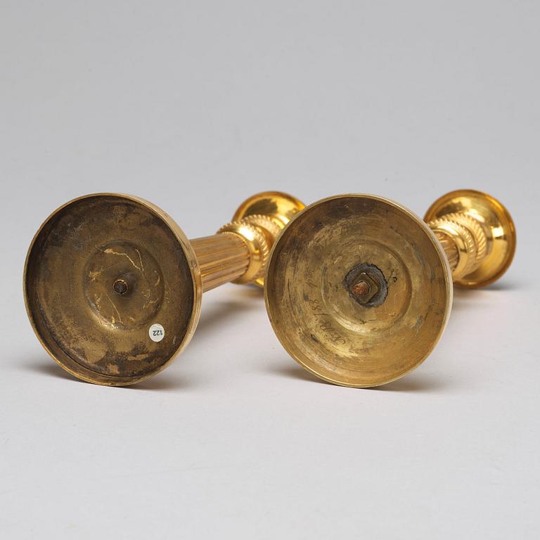 A pair of Empire-style candlesticks, ca 1900.