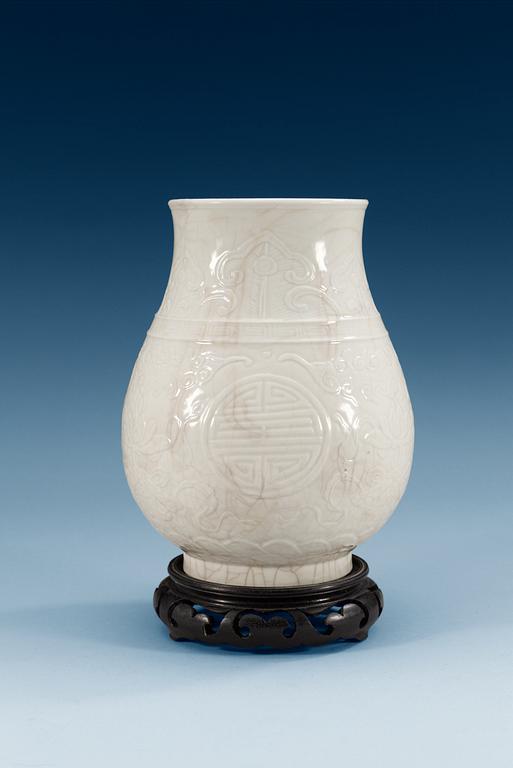 A set of two white glaze bronze shaped vessels, Qing dynasty, Kangxi (1662-1722).