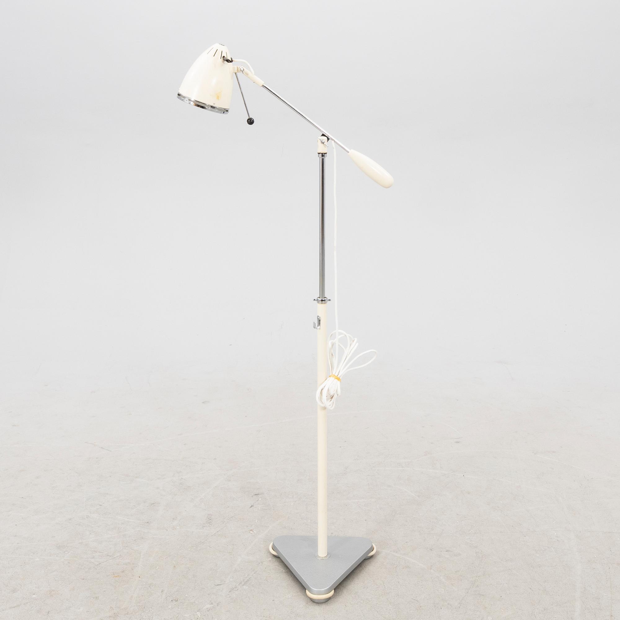 A mid 1900s industrial floor lamp.