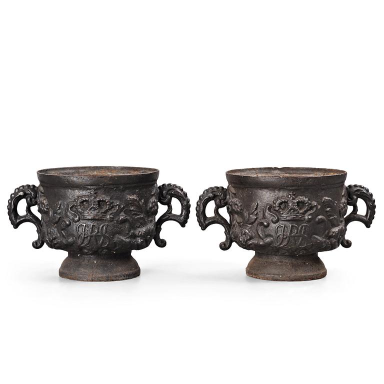 A pair of Swedish cast iron plant pot with the monogram of Queen Hedvig Eleonora, probably 1920's.