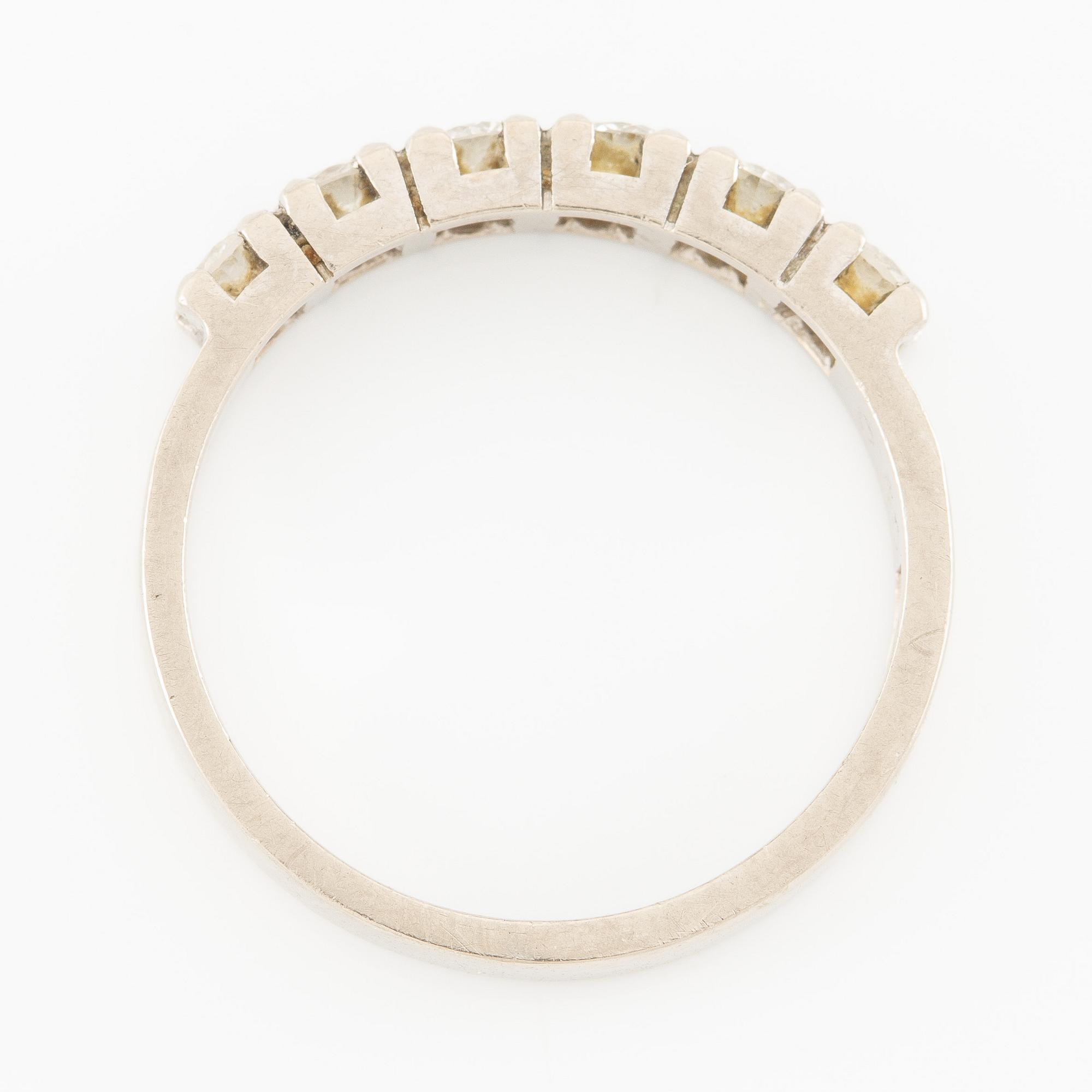 Ring, half eternity band in 18K white gold set with brilliant-cut diamonds.