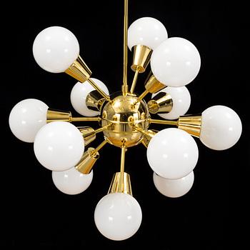 a brass and glas "Sputnik"-model ceiling light from the second half of the 20th century. Height ca 100 cm.