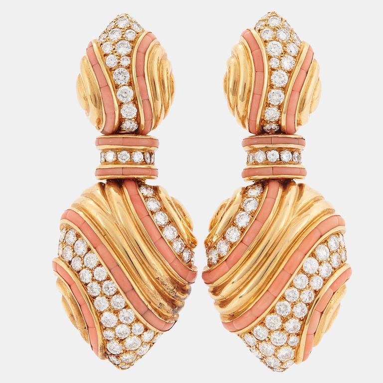 A pair of 18K gold Boucheron earrings set with round brilliant-cut diamonds and coral.