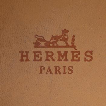 HERMÈS, a pair of white canvas espandrillos. Correlates to size 38 approximately.