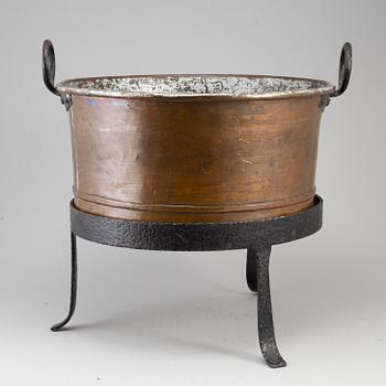 A 19th century copper cauldron.