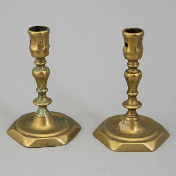 A PAIR OF BRONZE CANDLESTICKS, 18th century.