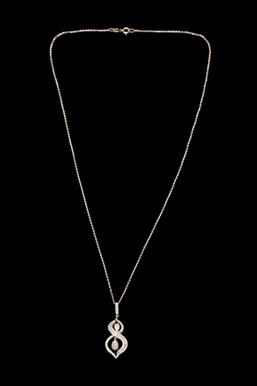 HÄNGE, vitguld 14K, små diamanter. Vikt 3,3 g.