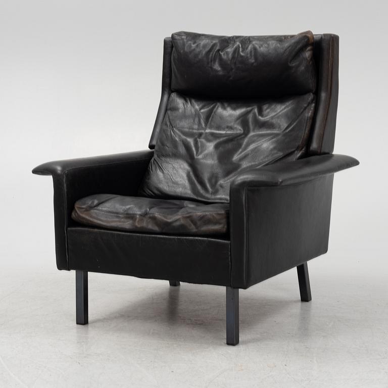 Arne Vodder, a leather armchair, Frits Hanzen, Denmark, 1966.