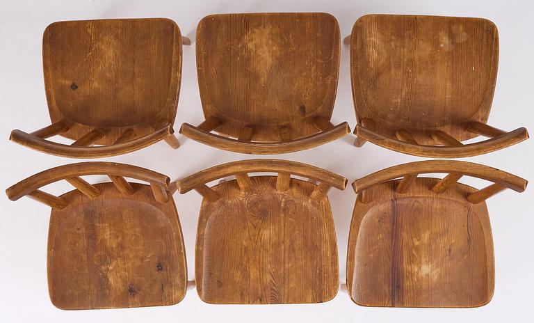 Axel Einar Hjorth, a set of six stained pine "Utö" chairs, Nordiska Kompaniet, Sweden, 1930s.