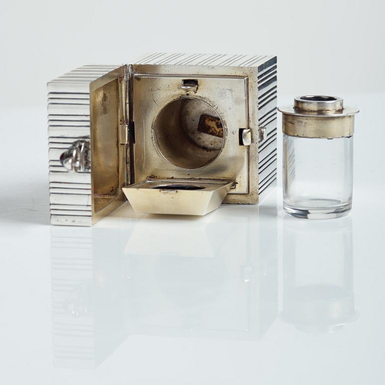 A Fabergé silver, travelling inkwell, workmaster Anna Ringe, St. Petersburg 1898/9-1903. Scratched inventory no 9623.