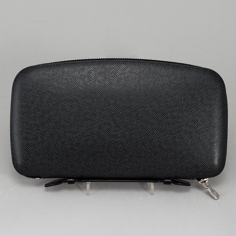 LOUIS VUITTON, an 'Atoll Ardiose' Taiga leather trave organizer, 2015.