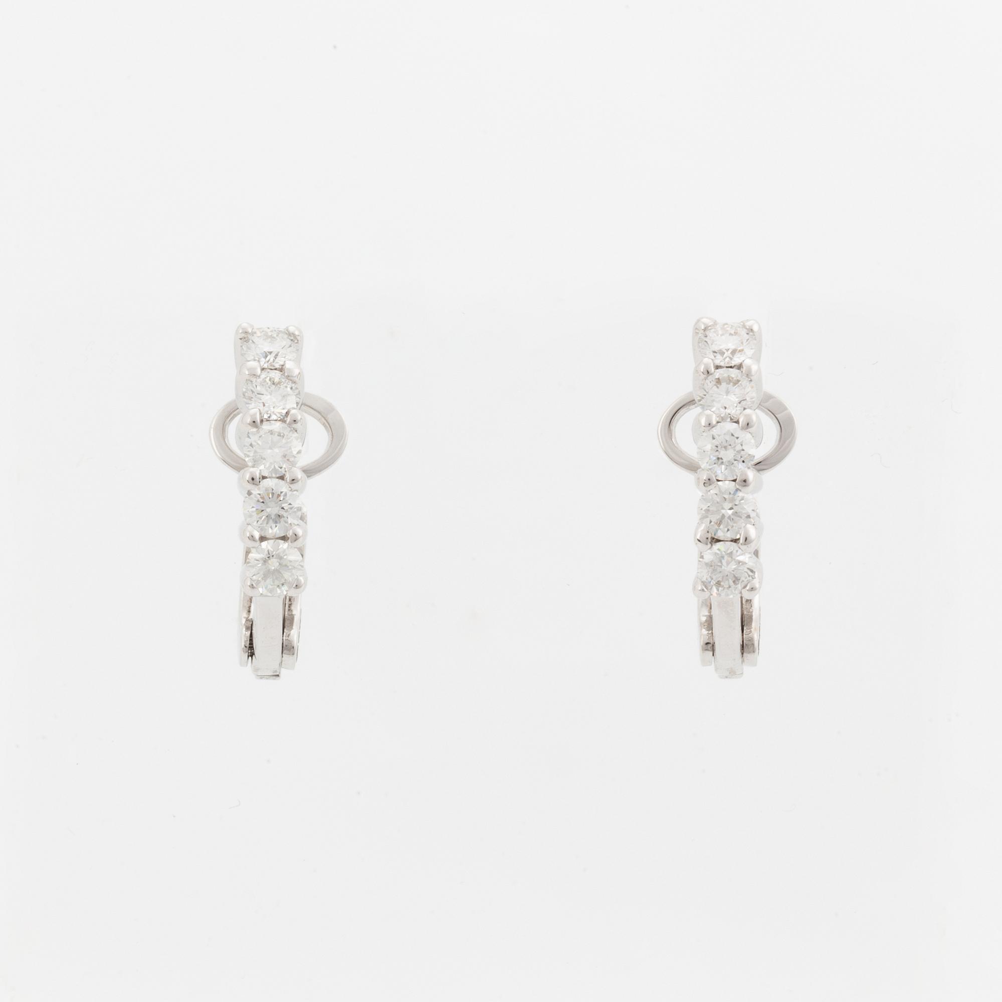Brilliant-cut diamond earrings.