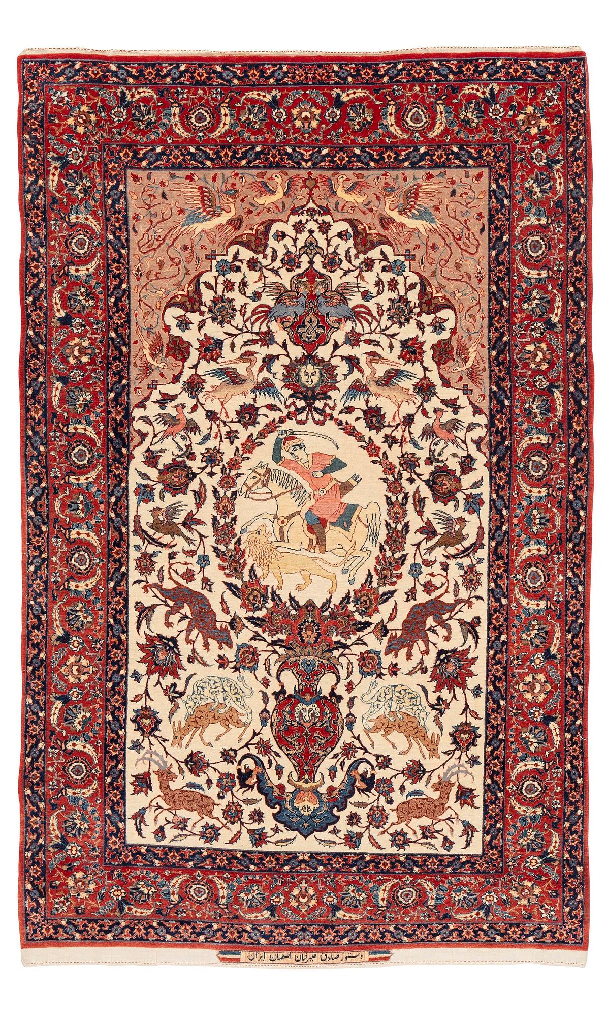 A semi-antique pictorial Isfahan rug signed (Sadegh) Seirafian, c. 170 x 116 cm.