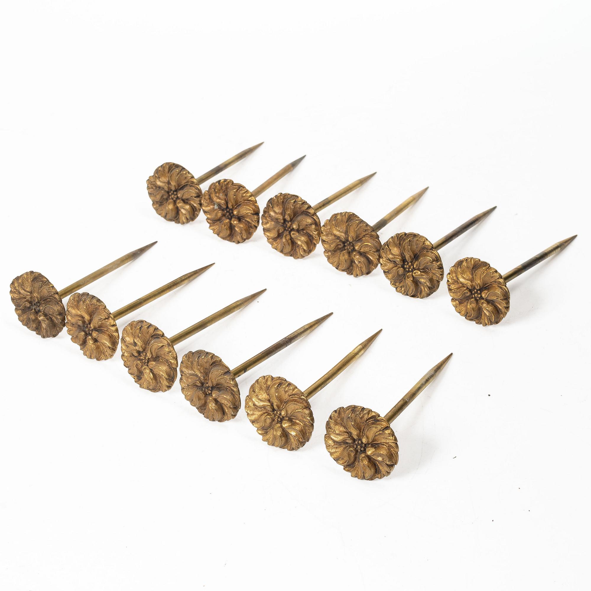 Twelve curtain tiebacks, 19th Century.