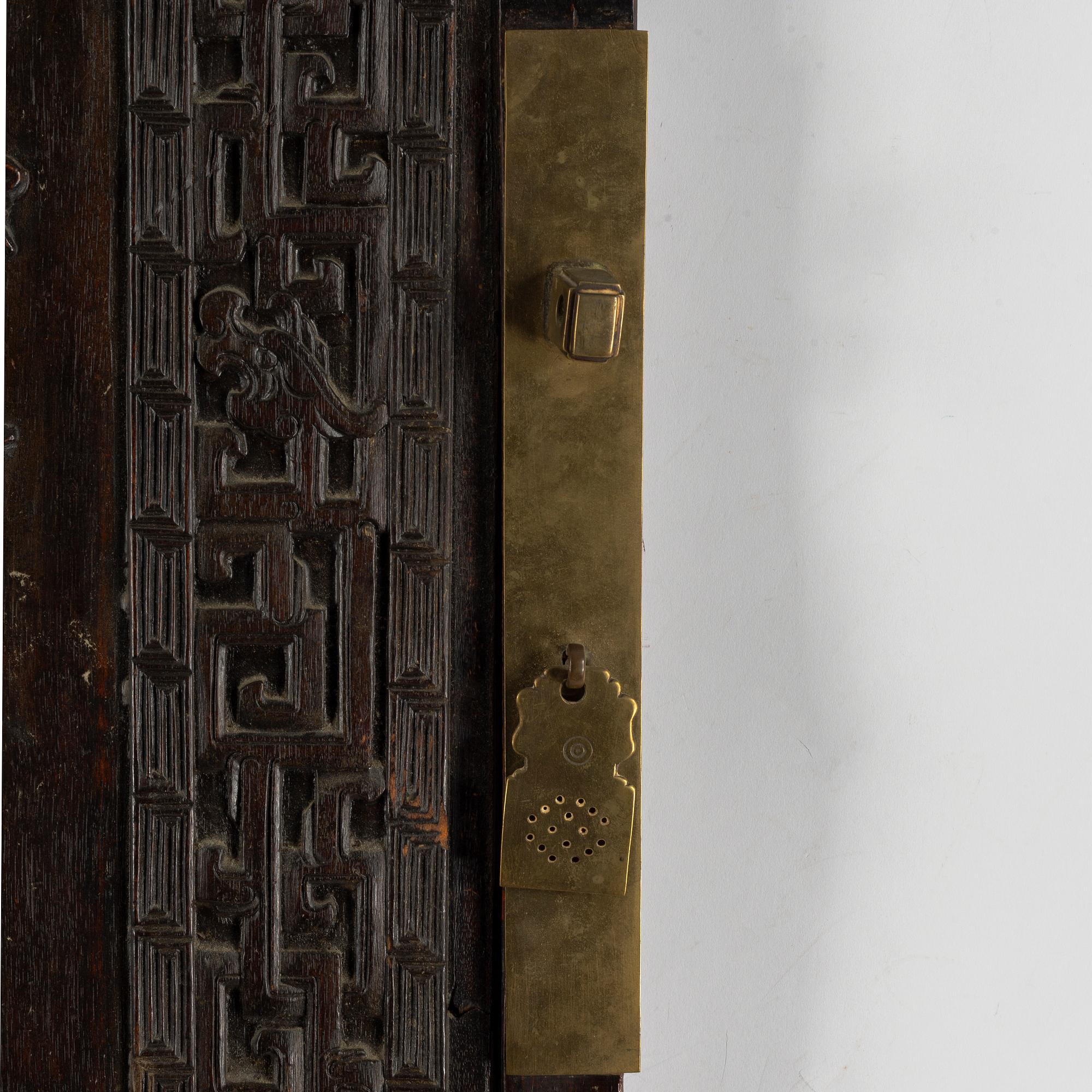 A Chinese wooden panel, Qing dynasty.