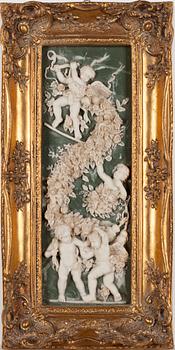 A late 20th century alabaster relief in gold plated frame.